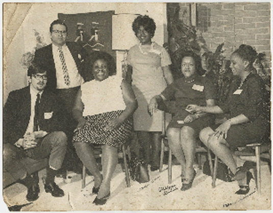Fannie Lou Hamer, seated at left, at a meeting of the Mississippi Freedom Labor Union