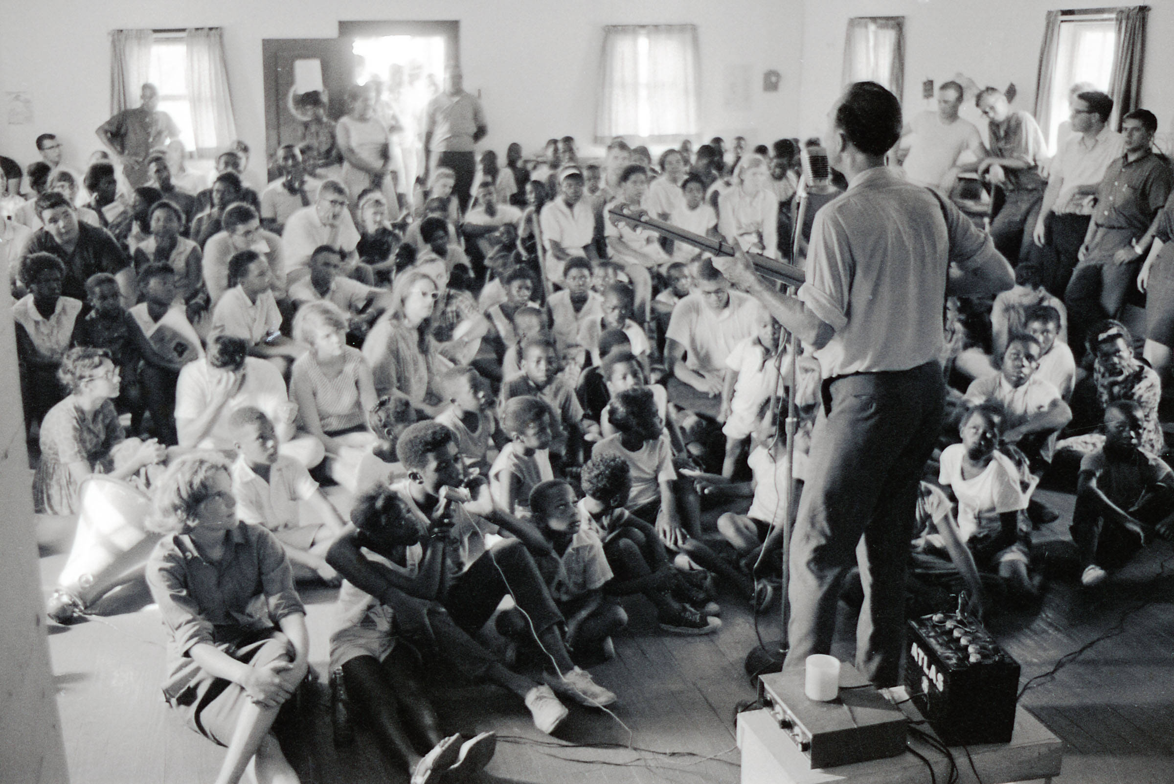 Pete Seeger performing at the Palmers Crossing Community Center 1964