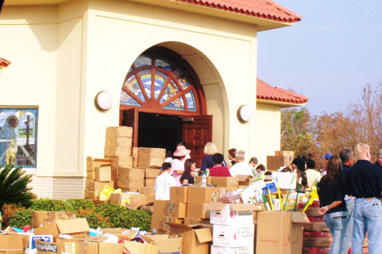 Supplies are distributed in post-storm relief efforts