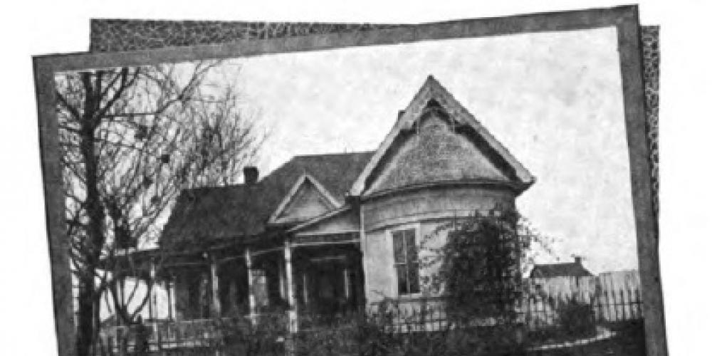 Photograph of Minnie and Wayne Cox’s home and parlor, circa 1911