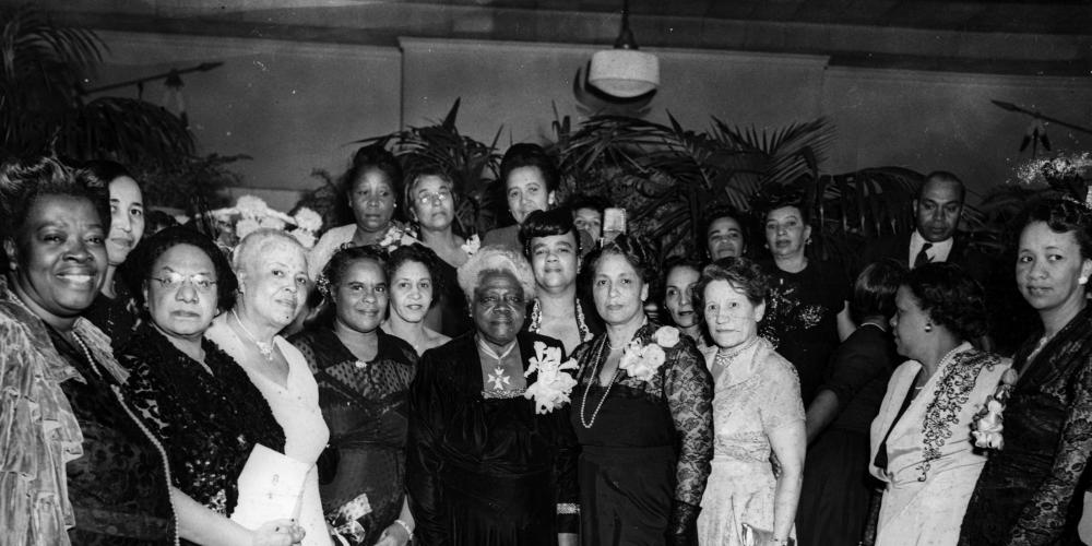 The closing dinner marking the retirement of Mary McLeod Bethune in November 1949. In the center of the photograph is Bethune. On the far right of the photograph is Dorothy Height, who served as NCNW president from 1957 to 1998 and helped boost its presence and activism in Mississippi. Photograph by Fred Harris, courtesy of the Mary McLeod Bethune Council House National Historic Site. The closing dinner marking the retirement of Mary McLeod Bethune in November 1949.